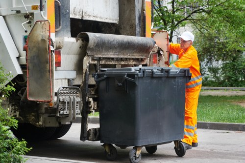 Segregated waste containers for different materials at site